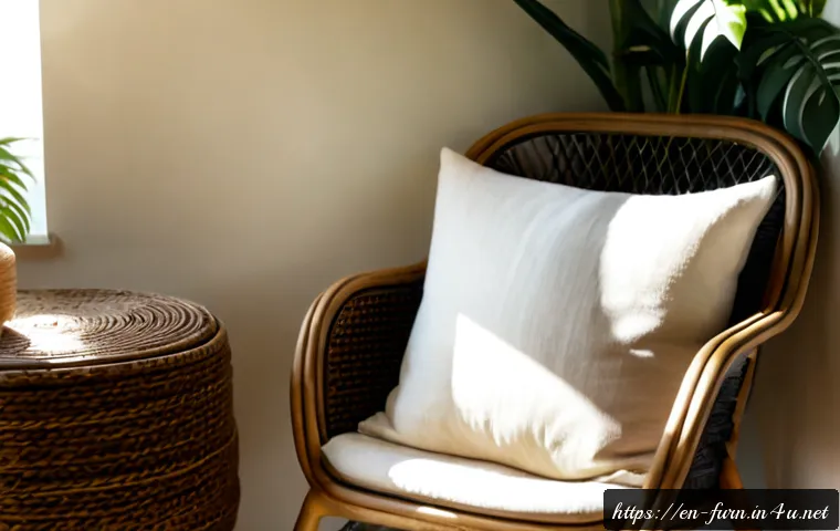 라탄 가구 장점 - Photorealistic sunlit living room featuring a handcrafted natural rattan armchair with woven texture...